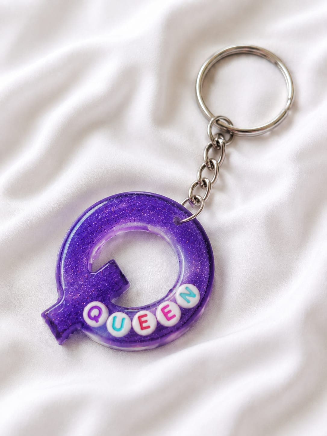 Violet resin Q keychain with Queen letter beads